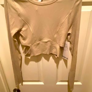 Lululemon LA Cut-Out-Waist Crop LS Size: 4
